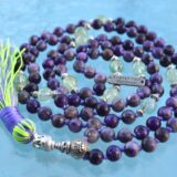 Charoite & Prehnite Mala Necklace with 108 hand-knotted beads, designed to balance the Heart and Third Eye Chakras. Enhances healing and spiritual growth, ideal for Virgo and Scorpio.