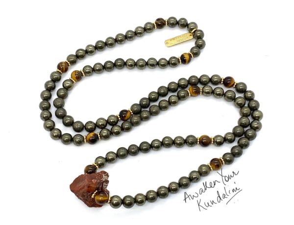 Carnelian, Pyrite & Tiger Eye Wrap Necklace featuring authentic beads designed to activate the Solar Plexus and Root Chakras. Ideal for Aries and Leo, it boosts vitality, confidence, and personal power.