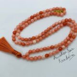 Orange Jade Mala Beads Necklace with 8mm hand-knotted beads, designed for creativity and abundance. Aligns Sacral and Solar Plexus Chakras, ideal for meditation or as a vibrant accessory. Perfect for Leo and Gemini signs.