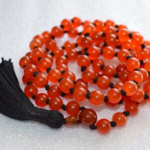 Carnelian Mala Necklace featuring 108 hand-knotted beads, designed to activate the Sacral and Solar Plexus Chakras. Ideal for Aries and Leo, it enhances vitality, confidence, and creativity.