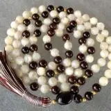  Mother of Pearl & Garnet Mala Necklace featuring genuine mother of pearl and garnet beads, designed for Sacral & Root Chakra balance, Capricorn & Aquarius empowerment, and enhanced emotional healing.