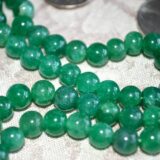 Green Jade Handmade Mala Beads Necklace featuring genuine jade beads, designed for Heart Chakra balance, Taurus & Libra energies, and fostering harmony and prosperity.