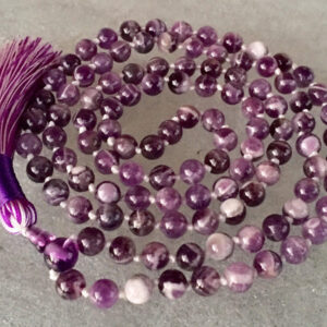 Chevron Amethyst Mala Necklace, harmonizing with Third Eye and Crown Chakras, ideal for Pisces and Aquarius zodiac signs, promoting intuition and spiritual growth.