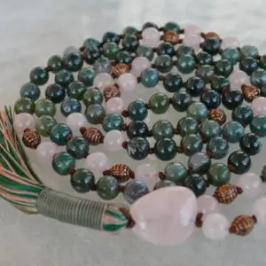 A Rose Quartz & Moss Agate Mala Necklace featuring genuine rose quartz and moss agate beads, associated with the Heart Chakra and Virgo zodiac sign, promoting love and healing.