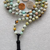 Amazonite Mala Beads Necklace with 108 hand-knotted beads, activating the Heart and Throat Chakras for communication and calming, associated with Virgo and Aquarius.