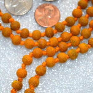 Haldi (Turmeric) Mala Beads Necklace made from natural turmeric beads, aligned with the Solar Plexus Chakra for purification and protection, ideal for Leo and Sagittarius zodiac signs.