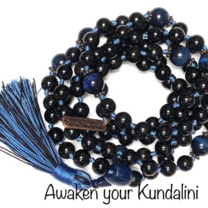 Tourmaline & Blue Tiger Eye Mala Necklace featuring 108 hand-knotted beads, combining Tourmaline for protection and Blue Tiger Eye for enhanced communication. Designed for grounding and clear expression, aligning with the Root and Throat Chakras, and resonating with Capricorn and Gemini.