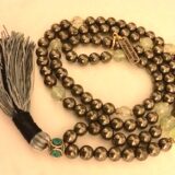 A Pyrite & Prehnite Mala Necklace with 108 hand-knotted beads, designed to boost confidence and healing, aligned with Solar Plexus and Heart Chakras, and ideal for Leo, Virgo, and Capricorn.