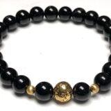 Custom Made Black Tourmaline Bracelet featuring AAA grade 6mm, 8mm, and 10mm beads for Capricorn sun sign, providing root chakra grounding and protection