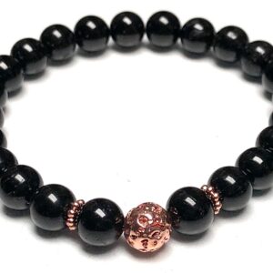 Black Tourmaline Stretch Bracelet for Capricorn sun sign, featuring root chakra grounding and emotional healing benefits