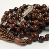 Mahogany Obsidian Mala Beads Necklace featuring genuine mahogany obsidian beads, designed for Root & Sacral Chakra balance, Capricorn & Sagittarius empowerment, and grounding & protection.