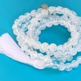 Crystal Quartz Himalayan Ice Mala Necklace designed to activate the Crown Chakra, offering clarity and spiritual awakening, suitable for all zodiac signs and crafted with pure Himalayan Ice Crystal Quartz.