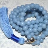 Celestial Angelite Mala Beads Necklace designed for Throat and Crown Chakras, ideal for Aquarius, promoting spiritual communication and peace.