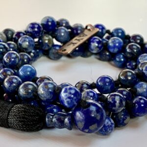 A Lapis Lazuli Necklace featuring 108 beads plus 1 guru bead. This necklace supports the Third Eye and Throat Chakras, resonates with Sagittarius and Libra, and promotes intuition and communication. Handcrafted for quality and comfort, it’s suitable for meditation and spiritual practice.