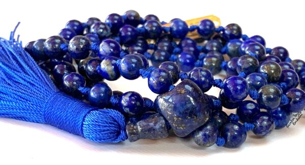 A Lapis Lazuli Beaded Necklace with hand-knotted beads, supporting the Third Eye and Throat Chakras. Resonates with Sagittarius and Libra, enhancing intuition and communication. Ideal for meditation and spiritual practice.