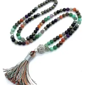 A Protection Crystals Mala Beads Necklace featuring smooth, authentic black tourmaline, fluorite, and amazonite beads, with a Parad (Mercury) guru bead. The mala is hand-knotted between each bead for durability and finished with a beautifully crafted tassel. It supports the Root and Solar Plexus Chakras, offering EMF protection, grounding, and psychic shielding.