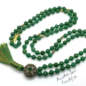 A tactile Green Aventurine Mala Necklace featuring 108 smooth beads plus 1 central guru bead. Designed for Heart Chakra healing, this necklace resonates with Virgo and promotes prosperity, emotional healing, and balance. Handcrafted with a focus on comfort, it is ideal for meditation and spiritual practices.