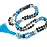 The Ultimate Aquarius Mala Necklace featuring high-quality gemstones, designed for Crown & Third Eye Chakra balance, January birthstone, and enhanced spiritual clarity and intuition.