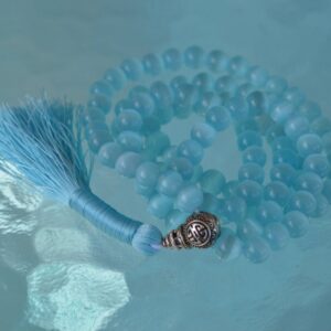 A Blue Cat's Eye Mala Necklace designed for Third Eye Chakra alignment, resonating with Gemini and Capricorn energies, enhancing intuition and protection.