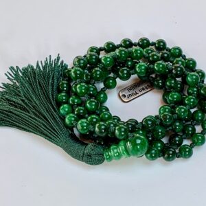 Green Jade Nephrite Mala Necklace featuring 108 hand-knotted beads, designed to activate the Heart Chakra for harmony and prosperity, associated with Aries and Taurus.