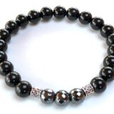  Black Tourmaline & Hematite Bracelet featuring genuine Black Tourmaline and Hematite beads, designed for Root Chakra balance and Capricorn birthstone support.