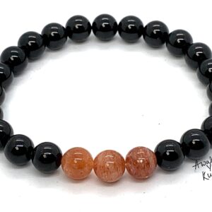 Black Tourmaline & Sunstone Bracelet featuring genuine Black Tourmaline and Sunstone beads, designed for Capricorn Sun Sign and Root Chakra energy enhancement.