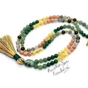 Crystals of Luck Mala Beads Necklace featuring Citrine, Chrysoprase, Tourmilated Quartz, Green Aventurine, Green Jade, and Sunstone, designed for attracting luck, prosperity, and protection, supporting the Heart and Solar Plexus Chakras, associated with Aquarius and Leo zodiac signs.