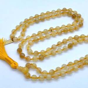 Citrine Mala Beads Necklace featuring radiant Citrine gemstones, hand-knotted, associated with Solar Plexus and Sacral Chakras for abundance and joy, aligned with Leo and Sagittarius.