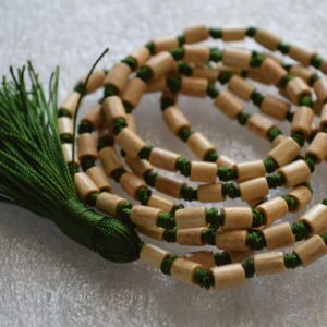 Drum Shape Tulsi / Holy Basil Prayer Mala Necklace featuring 108 hand-knotted drum-shaped beads, designed to activate the Heart Chakra for harmony and spiritual growth, associated with Libra energy.