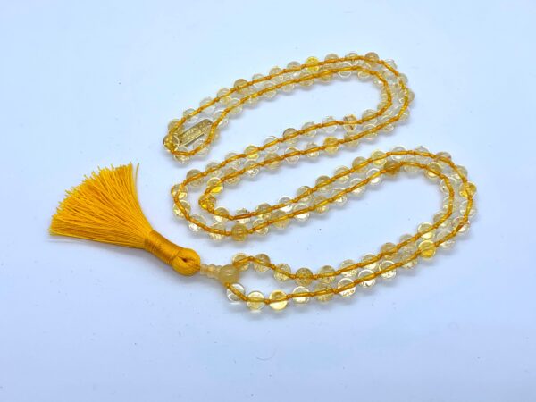 Natural Citrine Knotted Mala Necklace designed for Solar Plexus Chakra support, enhancing confidence and abundance, with a connection to Leo and Sagittarius.