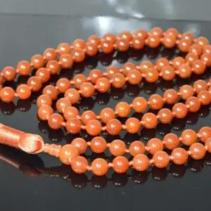 Orange Aventurine Mala Necklace Bracelet designed for creativity and confidence, featuring 108 beads, can be worn as both a necklace and bracelet. Associated with the Sacral Chakra, Cancer, and Leo zodiac signs.