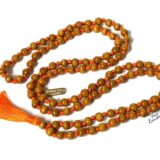 Tulsi Mala Beads Necklace crafted from natural Tulsi wood with 108 beads and a tassel, symbolizing spiritual purity and protection.