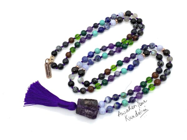 An Ultimate Sagittarius Necklace featuring 108 beads plus 1 guru bead, designed to support the Third Eye and Throat Chakras. This necklace resonates with Sagittarius, enhancing intuition, clarity, and communication. Handcrafted for quality and comfort, ideal for meditation and spiritual practice.