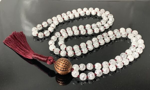 Crackle Quartz Mala Necklace featuring 108 hand-knotted beads, designed for clarity, amplification, and Crown Chakra activation. Resonates with Aries and Leo zodiac signs.