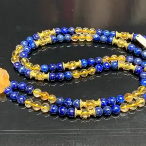 Lapis Lazuli & Citrine Mala Necklace designed for Third Eye and Solar Plexus Chakra support, resonating with Sagittarius and Leo, promoting intuition and abundance.