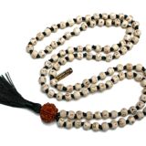 Holy Basil Hare Rama Krishna Mala Necklace featuring 108 hand-knotted Tulsi beads, designed for mantra meditation, spiritual grounding, and devotion, resonating with the Root Chakra and Capricorn zodiac sign.