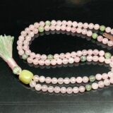 Rose Quartz & Prehnite Mala Necklace featuring 108 hand-knotted beads, designed to support the Heart and Solar Plexus Chakras. Ideal for Taurus and Libra, it promotes love, emotional healing, and personal empowerment.