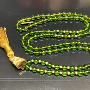 Peridot Knotted Mala Necklace designed for Heart Chakra support, enhancing emotional healing and balance, with gemstones resonating with Leo and Virgo.