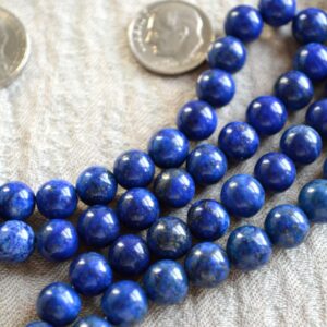 Lapis Lazuli Necklace featuring deep blue beads, designed for intuition, communication, and Third Eye and Throat Chakra activation. Resonates with Sagittarius and Libra zodiac signs.