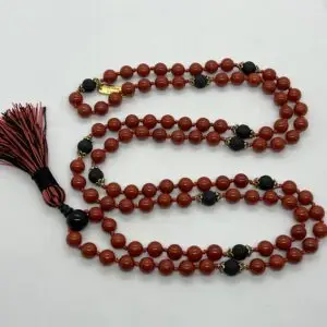  Basalt Lava and Red Jasper Mala Necklace featuring genuine beads, designed for Root Chakra balance and Aries strength and grounding.