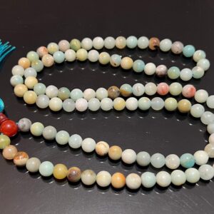 Amazonite Mala Necklace featuring 108 hand-knotted Amazonite beads, designed to inspire courage and truth. Ideal for meditation and spiritual practices, aligning with the Heart and Throat Chakras, and resonating with Virgo and Aquarius.