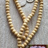 Tulsi Prayer Beads Japa Mala Necklace made from sacred Tulsi wood, aligned with the Heart and Crown Chakras for spiritual healing and devotion, ideal for Sagittarius and Virgo zodiac signs.