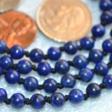 Lapis Lazuli Knotted Mala Necklace with 108 hand-knotted beads, designed to activate the Third Eye and Throat Chakras. Ideal for Sagittarius and Libra, enhancing intuition and communication. Perfect for meditation and spiritual growth.