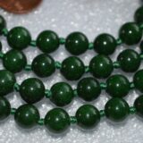 Green Jade Mala Necklace with genuine Green Jade beads, promoting abundance and healing, aligned with Heart and Solar Plexus Chakras for Pisces and Libra zodiac signs.