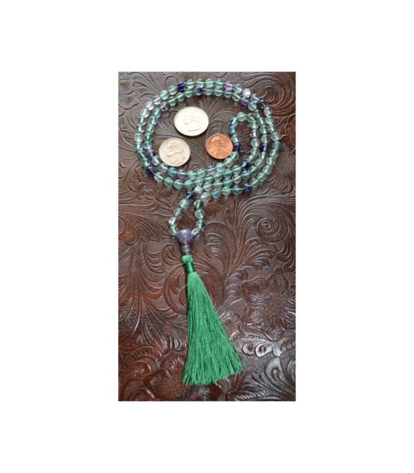 Fluorite Mala Necklace with 108 hand-knotted beads, designed to support Heart and Third Eye Chakra healing, promoting clarity, emotional balance, and spiritual growth, resonating with Pisces and Capricorn.