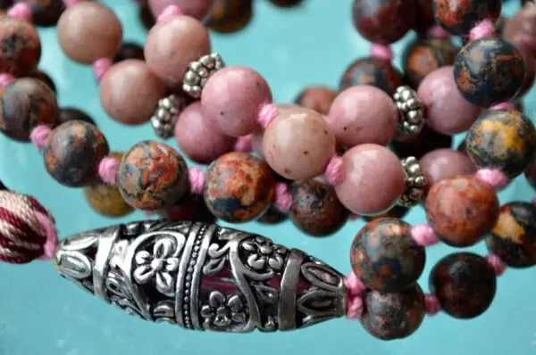 Rhodonite and Jasper Hand Knotted Bhakti Mala Beads Necklace featuring genuine rhodonite and jasper beads, designed for Heart and Root Chakra balance and Taurus emotional healing.