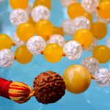 Yellow Jade Mala Necklace featuring 108 hand-knotted Yellow Jade beads, designed to enhance confidence and attract abundance. Ideal for meditation and spiritual practices, aligning with th