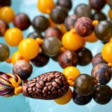 Labradorite, Jade & Leopard Skin Jasper Mala Necklace featuring 108 hand-knotted beads, designed for transformation and harmony. Ideal for meditation and spiritual practices, aligning with the Heart and Root Chakras, and resonating with Pisces and Aries