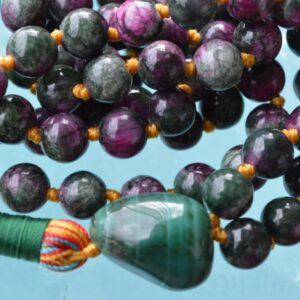 Anyolite (Green Ruby Zoisite) Mala Necklace with 108 hand-knotted beads, designed for passion and intuition, featuring a tassel for spiritual balance.