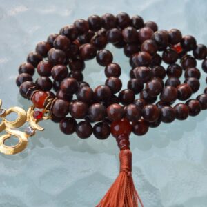 Mahogany Obsidian & Carnelian Mala Necklace designed for Root and Sacral Chakra support, enhancing grounding, passion, and personal power, with gemstones resonating with Aries and Scorpio.